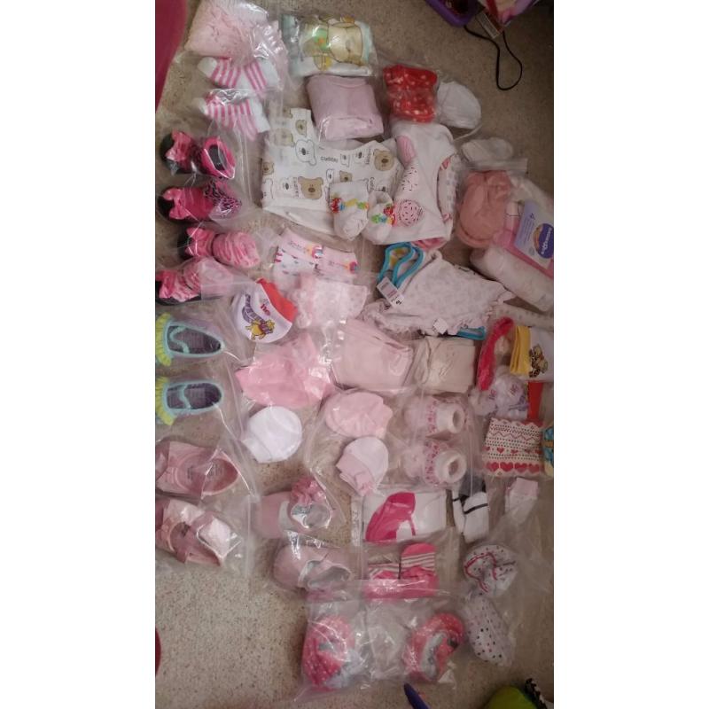 Box of newborn accessories and shoes all new