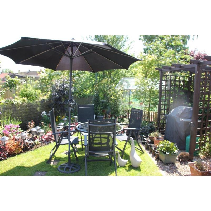 Garden Table, 4 chairs and umbrella