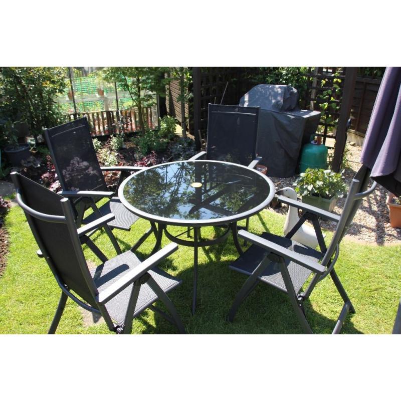 Garden Table, 4 chairs and umbrella