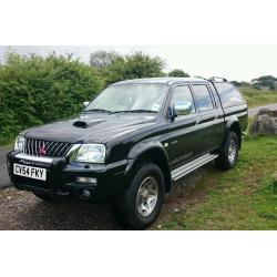 Mitsubishi L200 Warrior with genuine mitsubishi power upgrade