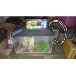 Small Fish tank with stand includes pump and ornaments