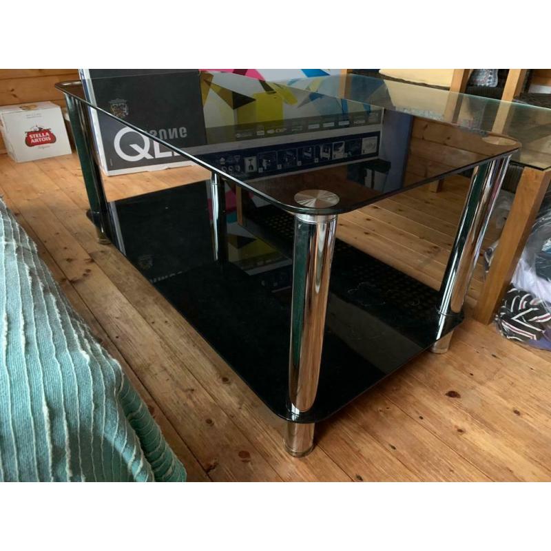 Tv glass table black 40cm x 98cmx 47cm. Used